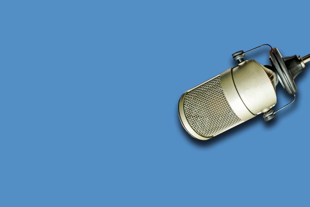 mic on silver blue background