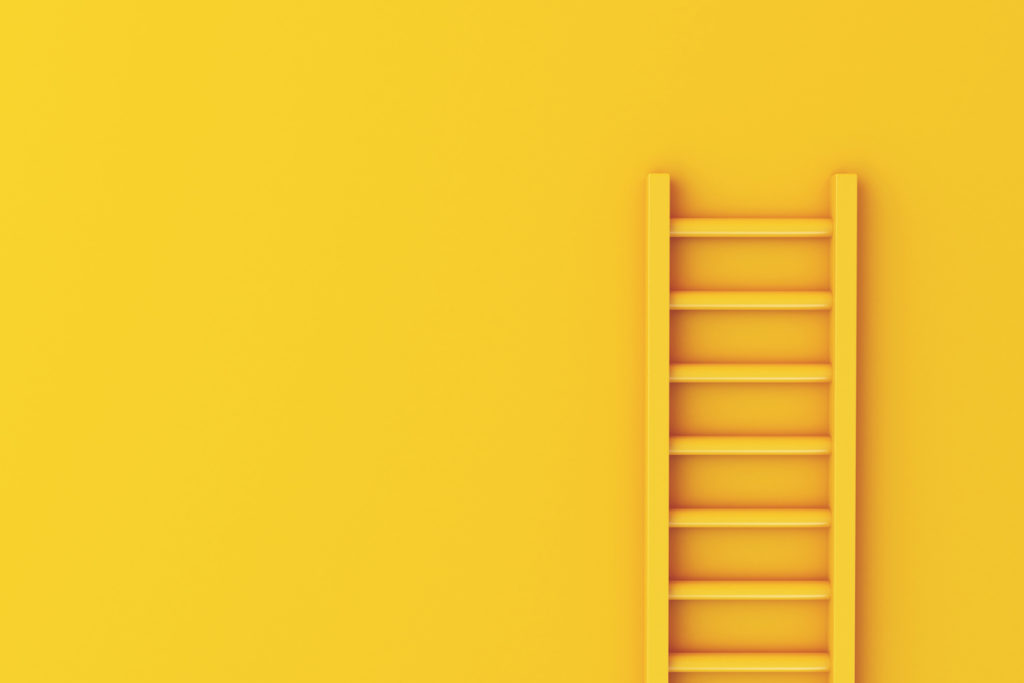 yellow ladder on yellow background