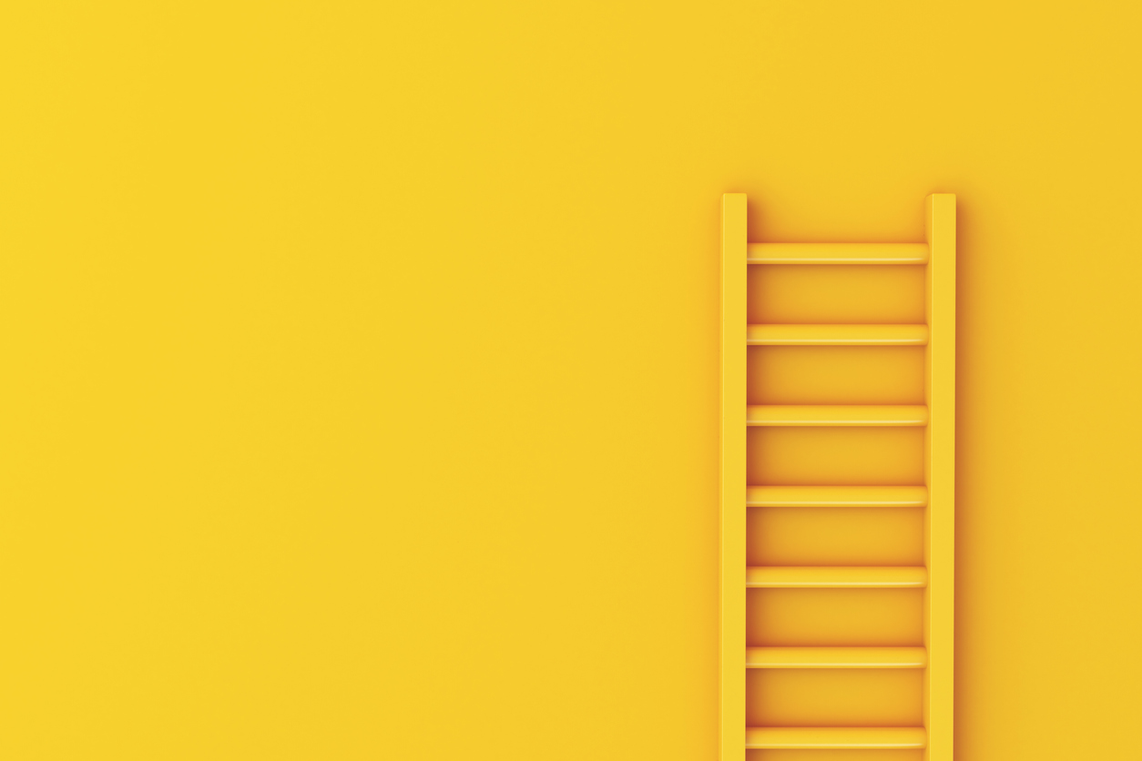yellow ladder on yellow background