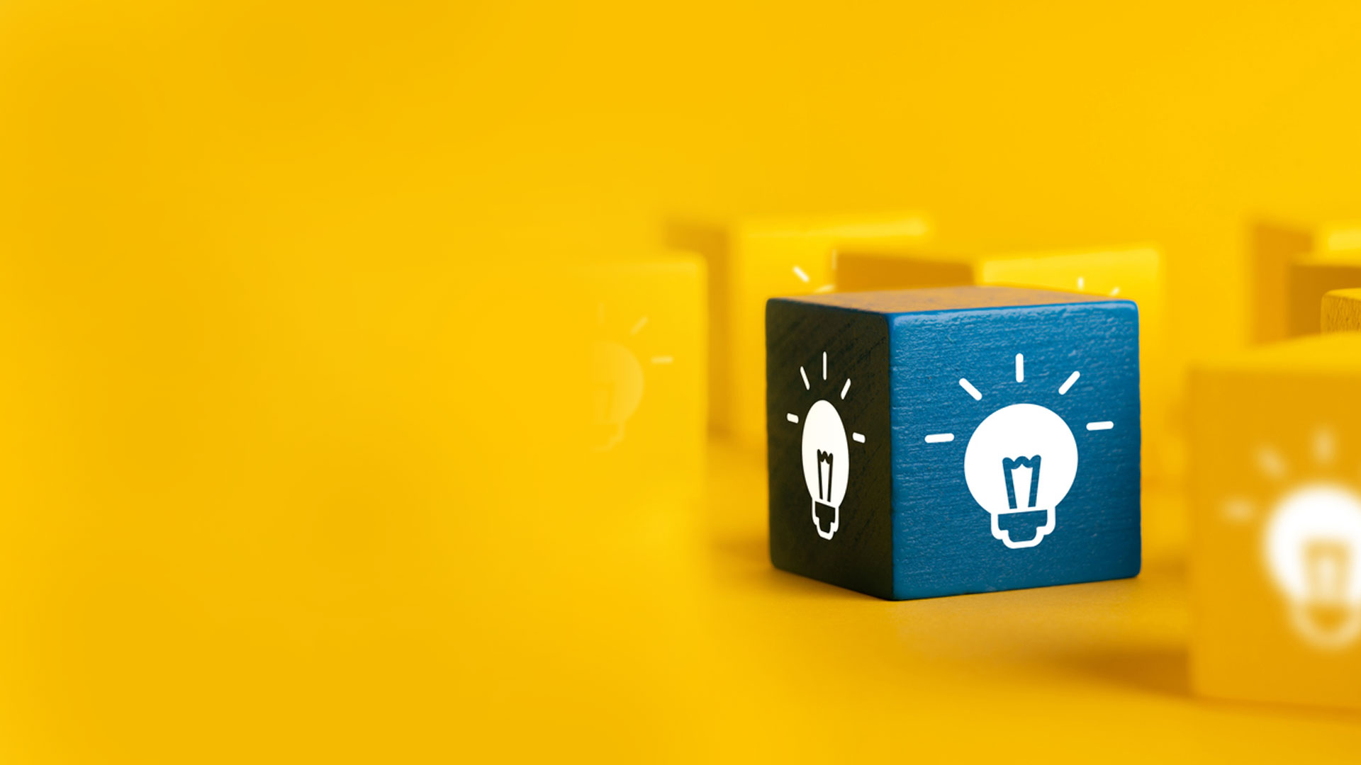 ightbulb and lamp icon on blocks for rethinking innovative marketing