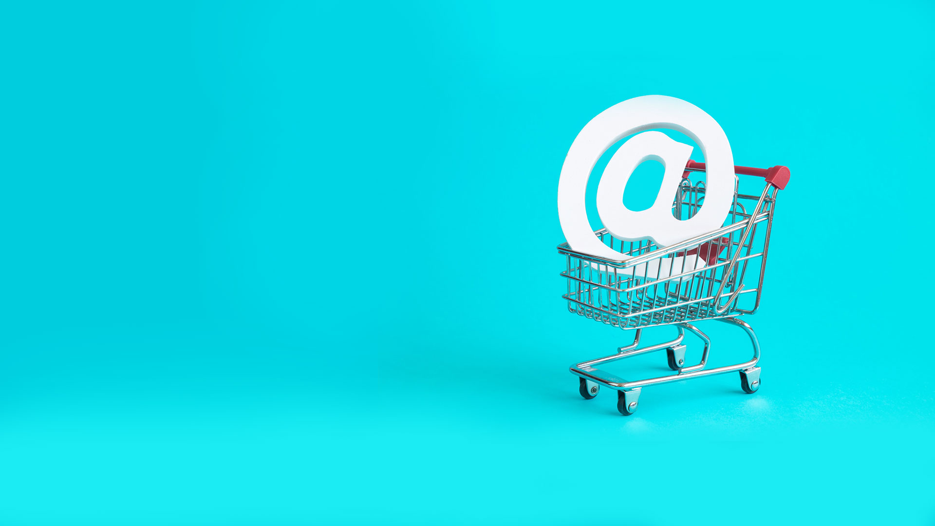 shopping cart with @ symbol for sales emails that sell - email