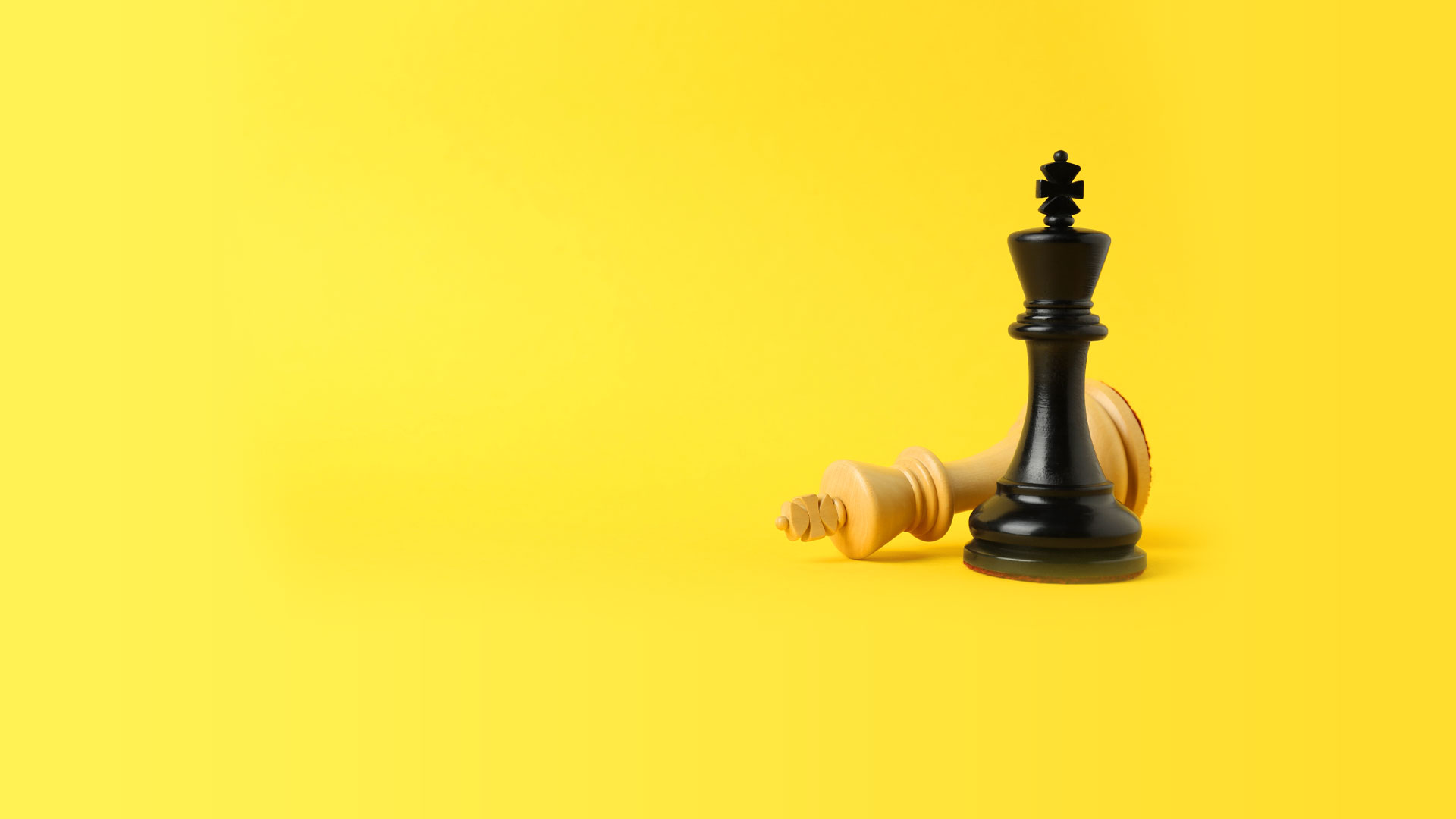 chess pieces on yellow background for modern competitive intelligence program