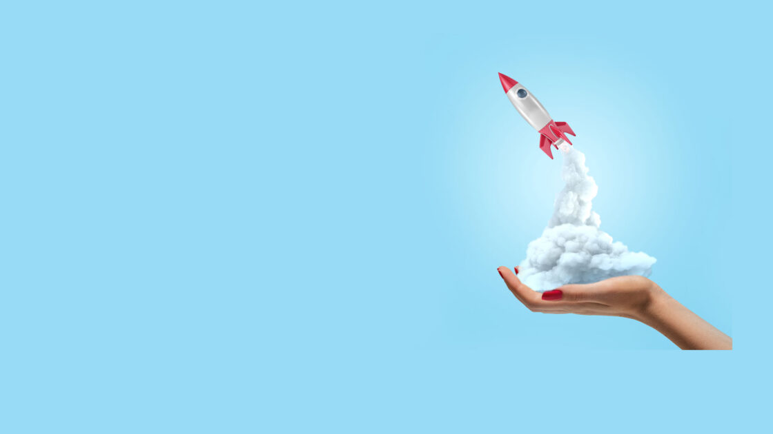 rocket ship launching from outstretched hand on blue background for product launch best practices