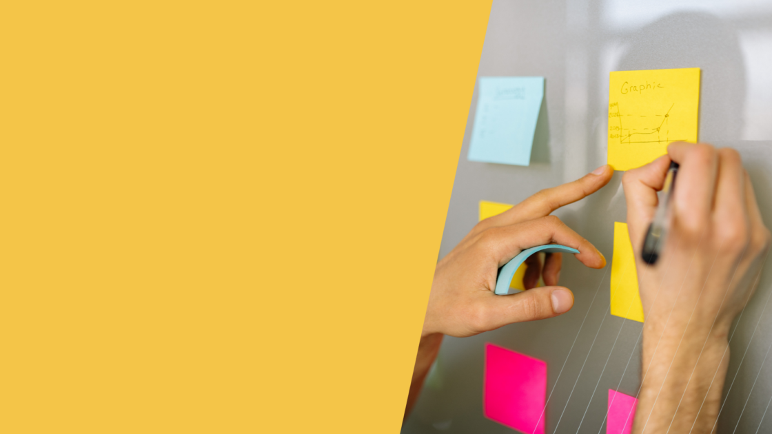 Product marketing team organizing ideas on sticky notes, representing product positioning strategy for high-growth B2B and evolving product messaging.