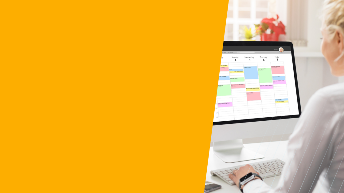 Marketer reviewing a content calendar on a desktop screen, representing B2B content distribution planning and strategies to maximize reach across channels.