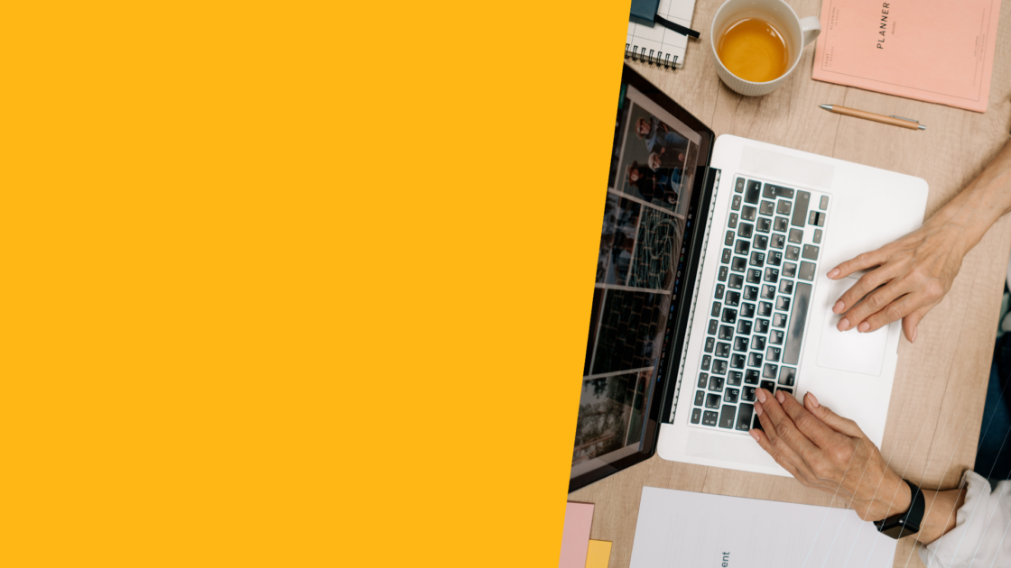 Person working on a laptop with a planner and notebook, representing how AI design tools accelerate content creation while strategic positioning and messaging drive conversion.